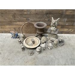 Small Victorian style cast iron urn, cast stone griffin on plinth, 13 garden figures, old vice and other items. 