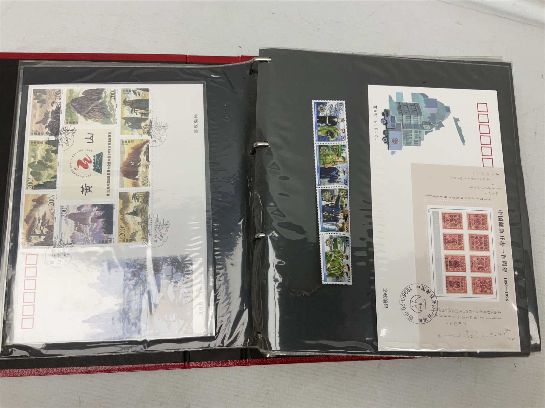 Mostly Chinese stamps including  covers and postcards, many being from the 80s and 90s, housed in ten folders