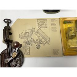 Dinky Kit No.1029 Ford D800 Tipper Truck in unopened original packaging; American Singer child's sewing machine; Spong's table mounting Bean Slicer No.632; and two wall mounting wooden die-cast model open display racks (5)