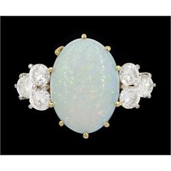18ct gold opal and six stone round brilliant cut diamond ring, London 1977, opal approx 2.60 carat, total diamond weight approx 0.65 carat