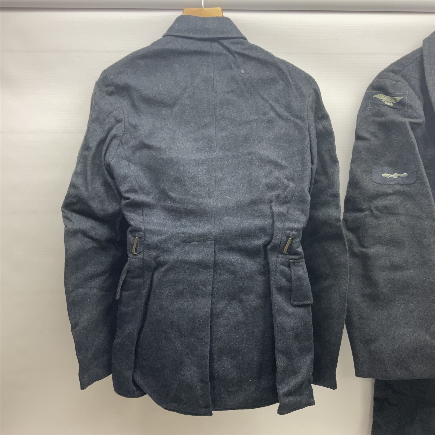 British RAF uniform, including jacket and trousers, modern RAF uniform buttons and a collection of reproduction wartime newspapers