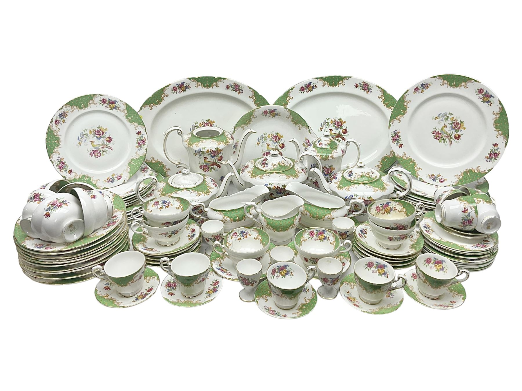 Paragon Rockingham pattern part tea and dinner service including three teapots, milk jug, cups and saucers of various sizes, ten soup bowls, ten side plates, ten dinner plates etc (96)