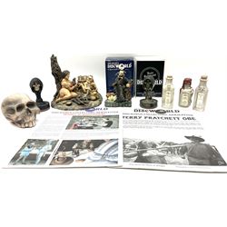 Terry Pratchett Discworld figures, designed by Clarecraft, comprising Cohen the barbarian, DW42, the Patrician, boxed, DW37, three Potions, DW18, DW19, DW20, two Death Bookstamps, DW50, the Gods Dice Box, boxed, DW26, together with two Discworld newsletters, volume 5, August 1998 and volume 6, August 1999. 
