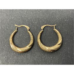 Two pairs of 9ct gold hoop earrings 