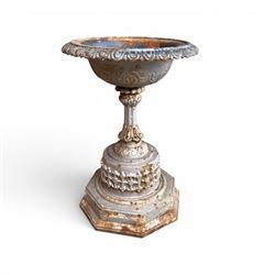 Small ornate painted 19th-century Meadow Foundry cast iron centrepiece urn, with wide, scalloped bowl rim decorated with a repeating egg and dart decoration, supported on a slender fluted pedestal with raised quatrefoil design on an octagonal plinth base  