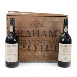 Graham's 1983 vintage port, 75cl unknown proof, twelve bottles, cased