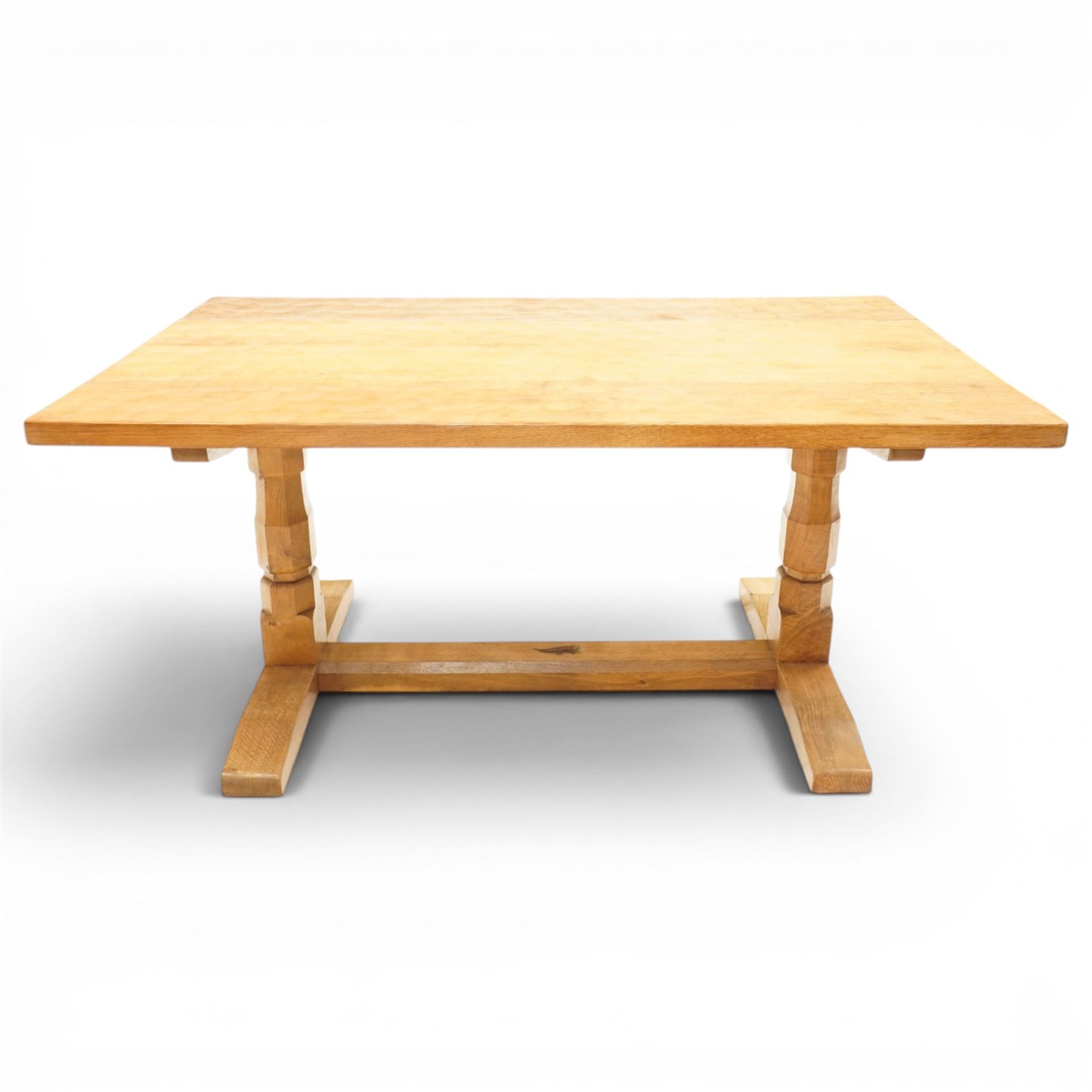Lizardman - 5' oak refectory dining table, rectangular adzed top, octagonal turned supports united by stretcher with carved lizard signature, by Derek Slater of Crayke