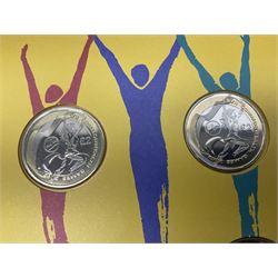 The Royal Mint Queen Elizabeth II 2002 Manchester Commonwealth Games four coin two pound coin cover