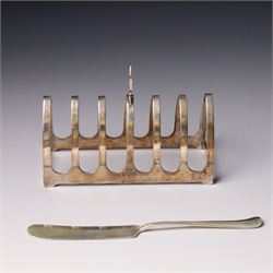 Silver six division toast rack with loop handle Sheffield 1938 Maker Viners and a silver b...