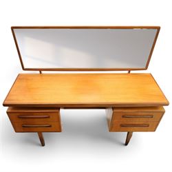G-Plan - ‘Fresco’ teak dressing table, rectangular top with raised rectangular mirror, fitted with four drawers arranged as twin pedestals with sculpted handles, central knee-hole, on tapering supports