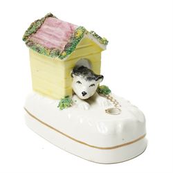 Pair of late 19th century Staffordshire pen holders, modelled as dogs in kennels, W9.5cm