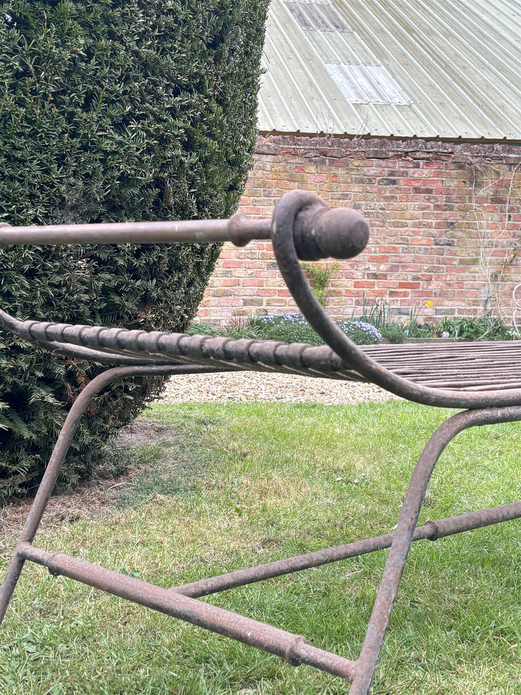 Large scrolling wrought iron garden bench in the classical style. L178cm, D70cm, H60cm.  - COLLECTION BY APPOINTMENT FROM: The White House, Thirsk Road, Easingwold, York, YO61 3NF - CALL 01723 507111 TO ARRANGE