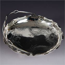 Chinese export silver swing handled basket, of circular for with crimped rim and knotted wirework handle, engraved with a dragon to centre, upon three bun feet, with maker's mark T.H, character marks and 95 to underside, including handle H17cm