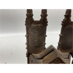 Four cast-iron money banks - 'Bear On Hind Legs bank' c1906 H16cm; 'ERII English Throne Bank' 1953 H21cm; both made by John Harper; 'Tally-Ho Bank' c1906 by Chamberlain & Hill H11.5cm; and 'Westminster Abbey Bank' c1908 by Sydenham & McCoustra H16cm (4)