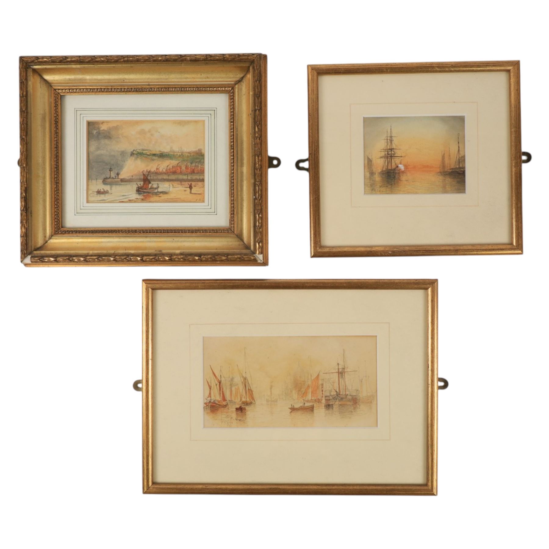 W R Nixon (British 19th Century): Shipping Scenes at Sunset, two small watercolours signed and dated 1886, max 9.5cm x 18cm; together with a small watercolour of Whitby signed with monogram EHG (3)