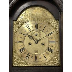 18th-century profusely carved oak longcase clock - with a pagoda pediment, upstands and carving, 
 break arch hood door flanked by reeded pilasters with brass capitals, trunk with canted corners and a spire topped door, square plinth with applied skirting, break arch brass dial with wheatsheaf engraving and cast cherub and crown spandrels, engraved break arch with the London clockmakers name John Gordin, silvered chapter ring with Roman numerals, five minute Arabic's, minute and quarter hour tracks, matted dial centre with ringed winding holes, square date aperture and seconds ring, dial pinned to a five pillar movement with inside countwheel striking, striking the hours on a cast bell. With weights and pendulum. John Gordin, is possibly a mis-spelling or phonetic spelling of John Gordon, of London, who worked from Ludgate Street in the parish of St. Gregory by St. Pauls. Apprenticed in 1689 and died in 1732 when his will was proven.
