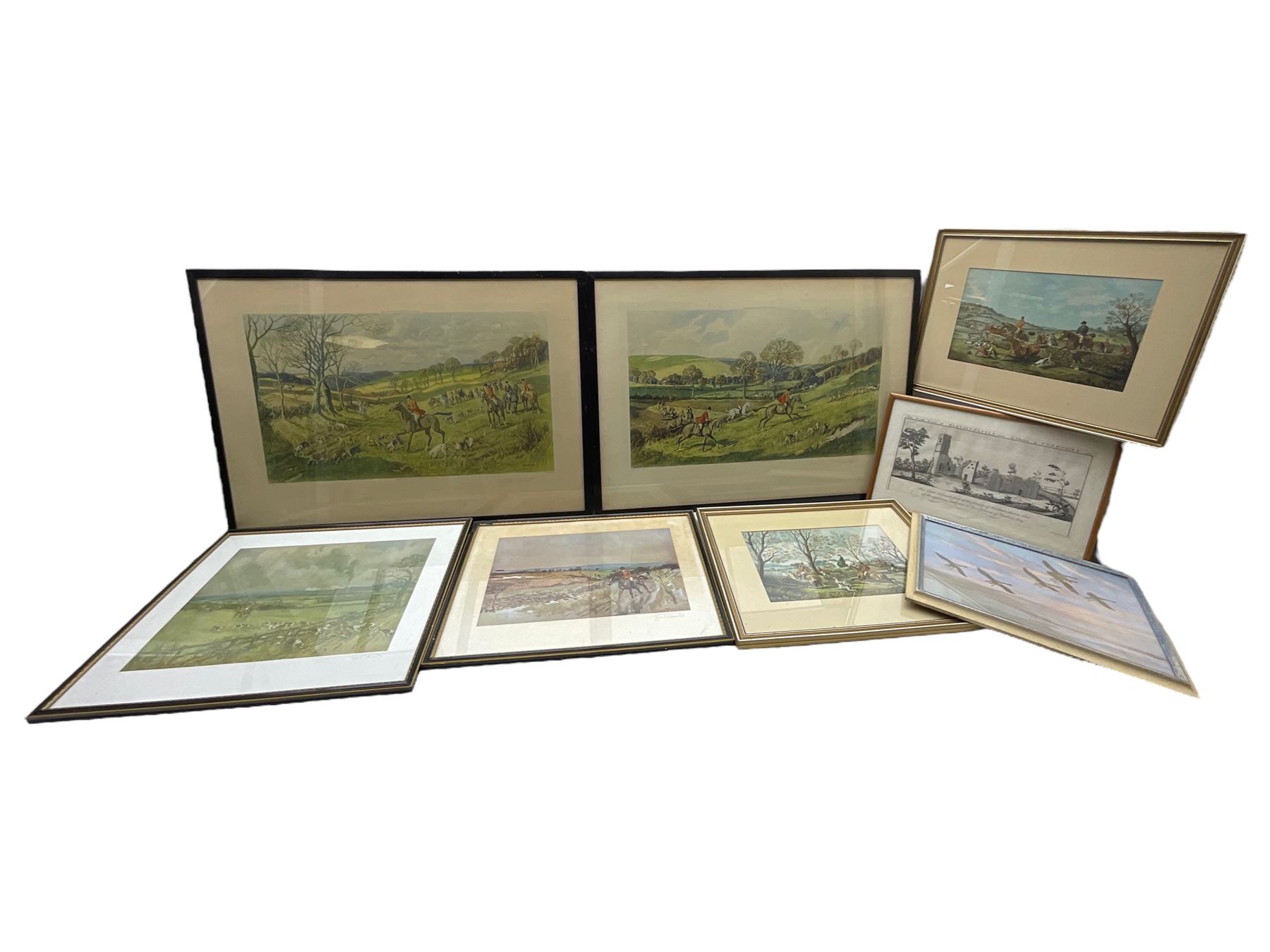 Lionel Edwards (British 1878-1966): pair of hunting prints signed in pencil; After Robert Hugh Buxton (1871-c1965): 'A Check in the Valley' and 'Over Hill and Dale', pair chromolithographs; Samuel Buck (British 1696-1779): 'The South View of Harlsey Castle near Northallerton Yorkshire', engraving; together with two further hunting prints and a Peter Scott print (8)