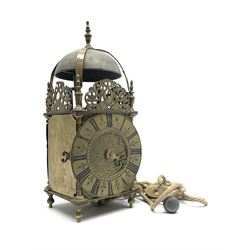 Brass lantern clock, raised strapped bell with final above pierced and dolphin engraved frets, the engraved dial decorated with foliage and signed 'Richard Breckells de Holmes Fecit', Roman chapter ring decorated with fleur-de-lus motifs