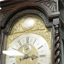 Man Beckett (I) of Stockton on Tees (Co Durham) - 8-day early 18th  century longcase clock in a  profusely carved oak case, with a caddy top, turned finials and attached barley twist pilasters to the break arch hood door, long trunk with carving and a conforming long rectangular door carved with a Celtic depiction of the tree of life, corresponding plinth with a carved and decorative base, break arch brass dial with a rounded brass surround, cast spandrels and silvered boss with the makers name to the arch, matted dial centre with seconds dial, ringed winding apertures, square date aperture and fettled steel hands, silvered chapter with Roman numerals, five minute Arabic's, half hour markers, minute and inner quarter hour tracks, dial pinned to a five pillar movement with inside countwheel striking and a recoil anchor escapement, striking the hours on a bell. With weights and pendulum.
Man Beckett (I), (first name is a biblical name short for Manasseh), was the first member of the Beckett family of prodigious clockmakers working in the North-East of England from 1720 until 1884.