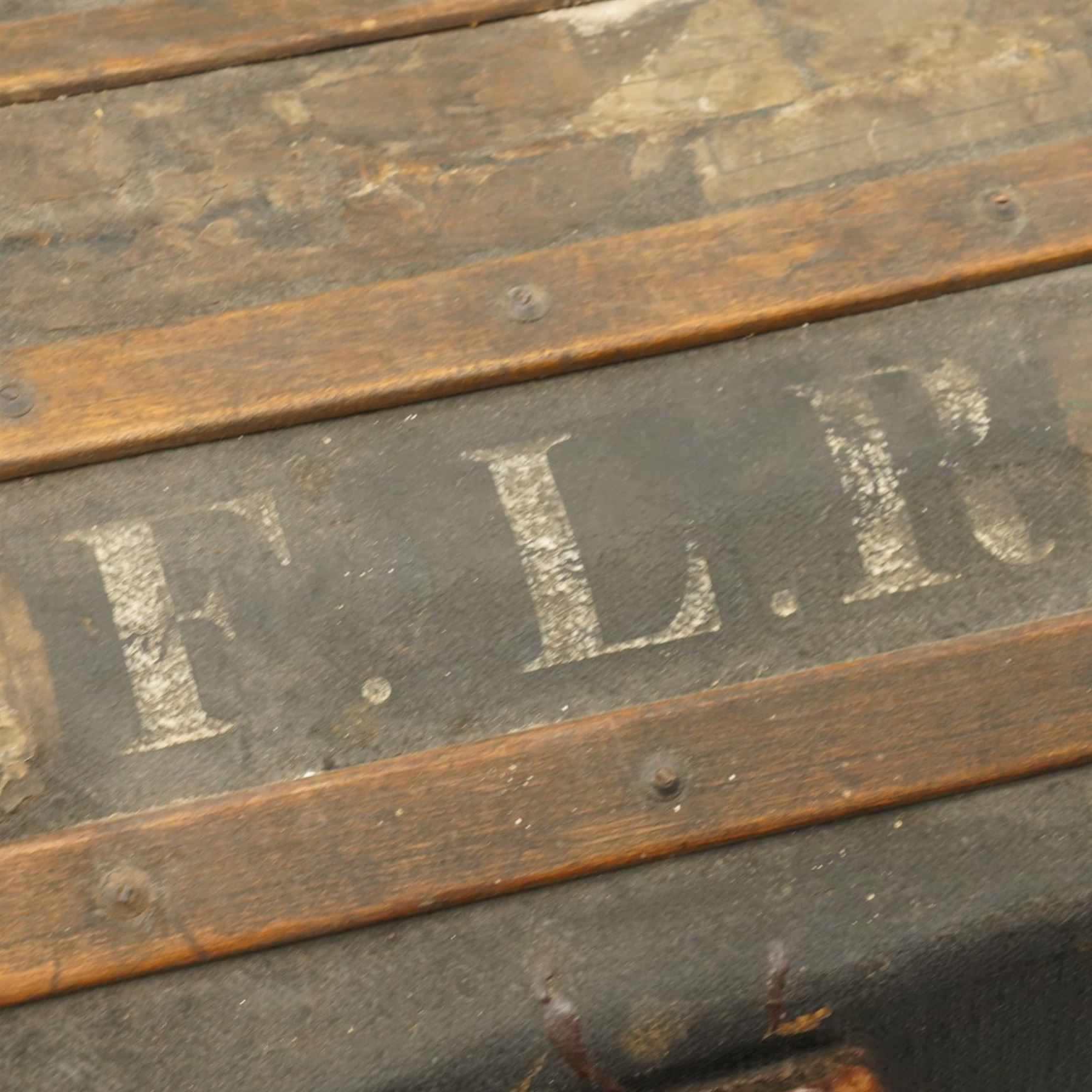 19th century leather and oak bound dome-top trunk with Waterloo and other affixed travel labels