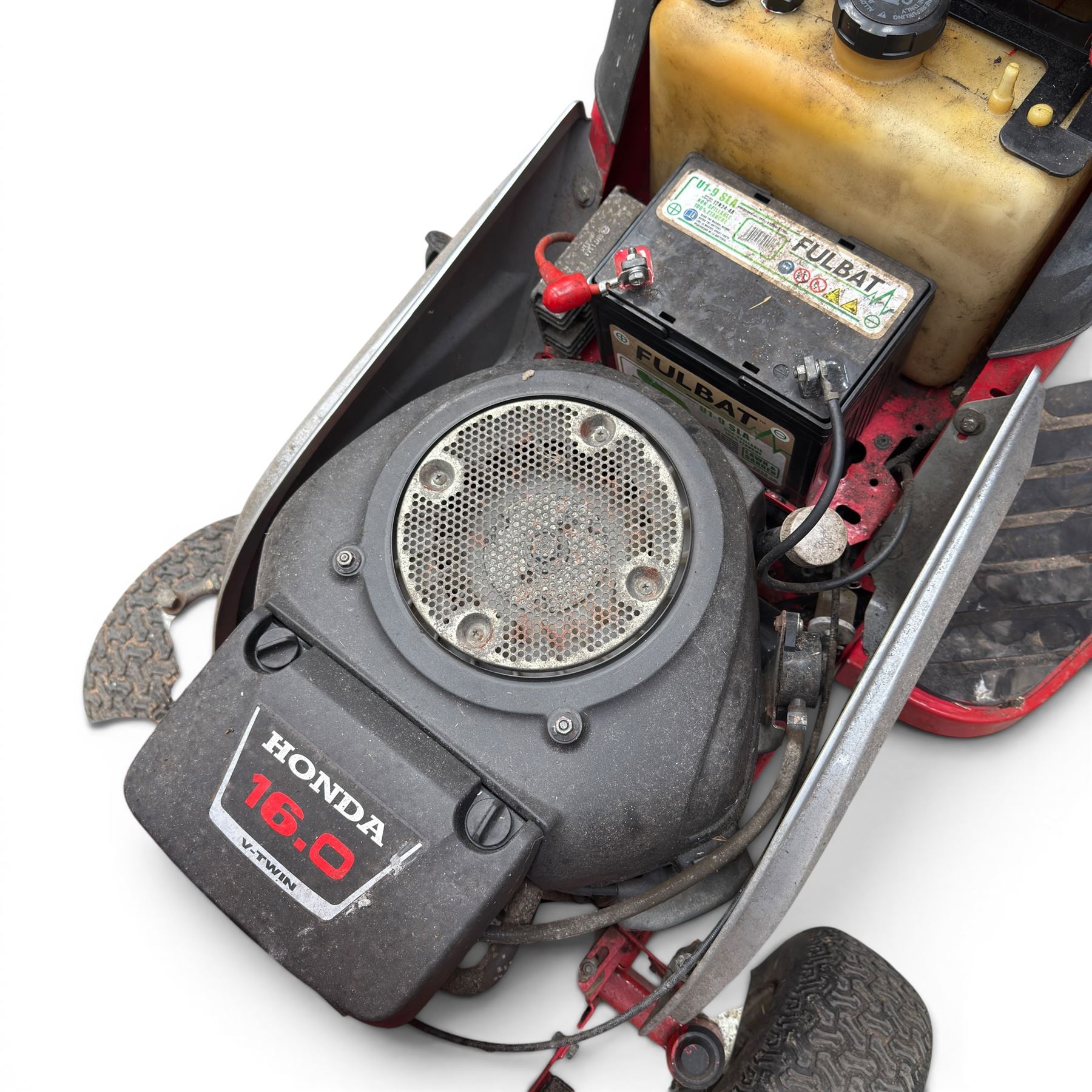 Countax C600H - ride on lawnmower / yard tractor with Honda engine, black seat and red bodywork.