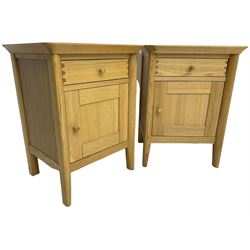 John Lewis - pair of oak bedside cabinets, each fitted with single drawer and panelled cupboard 