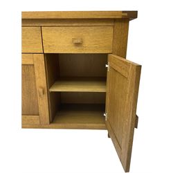 Solid oak sideboard, rectangular top, fitted with two drawers over two cupboards with wooden handles