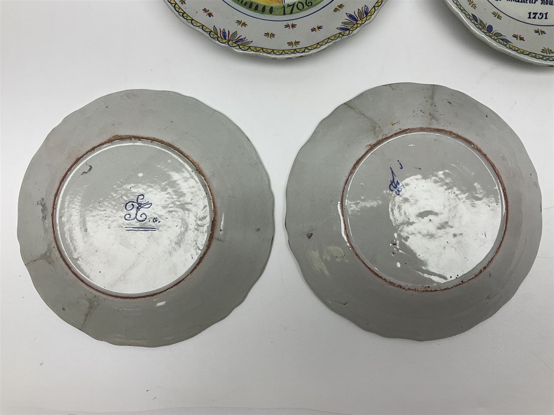 Four French Faience plates, comprising Je suis las de le porter, Le malheur nous reunit, Je desire y arriver and Eveque de Meaux, D24cm  