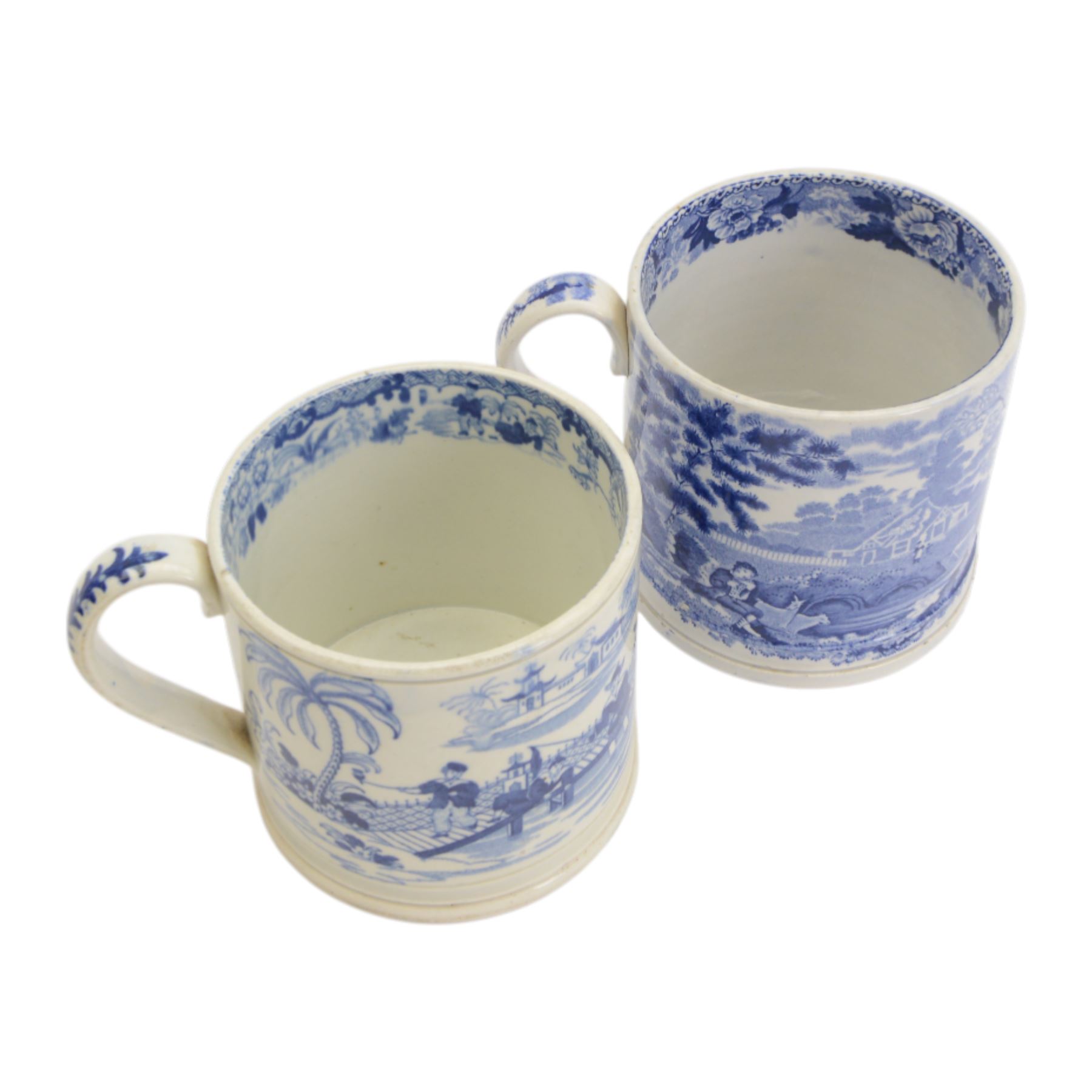 Two large 19th century blue and white transfer decorated pearlware mugs, the first example depicting a Chinese landscape with pagoda, and figures at rest and play, the second a pastoral landscape with shepherd and goats by waters edge, each approximately H12.5cm