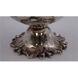William IV silver christening mug, of campana form, the body repousse decorated with fruiting vines, engraved with crest and quote 'God is our strength', with leaf capped scroll handle, upon spreading vine leaf foot, hallmarked Charles Fox, London 1837