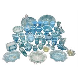 Collection of victorian and later blue vaseline glass, to include footed bowls, jugs, vases, tumblers, baskets, candle sticks etc 