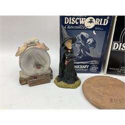 Terry Pratchett Discworld figures, designed by Clarecraft, comprising Lias Bluestone DW82, Hogfather DW72, Granny Weatherwax, boxed, DW06, Ridcully DW61and 'Ironcrust's genuine dwarf bread'.