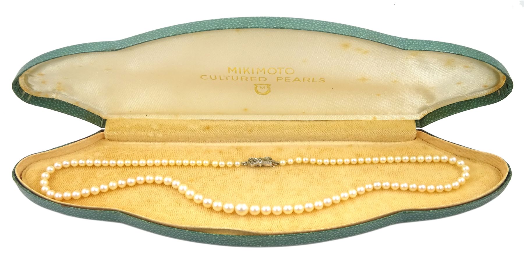 Mikimoto single strand cultured cream / white pearl necklace, with silver marcasite clasp, boxed