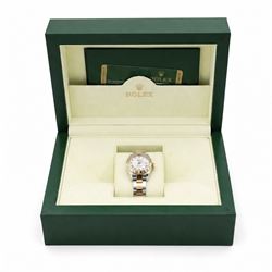 Rolex Oyster Perpetual Datejust ladies stainless steel and gold automatic wristwatch, circa 2009, Ref. 179313, serial No. V739209, white dial with Roman numeral hour markers and 18ct gold diamond set bezel, on gold and stainless steel and gold Oyster bracelet, with fold-over clasp, boxed with papers