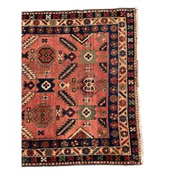 Near pair of Persian Azerbaijan red ground runners, each rug decorated with Nazarlik and stylised leaf motifs, enclosed with three band border decorated with flower heads and geometric motifs 

406cm x 99cm 
409cm x 102cm
