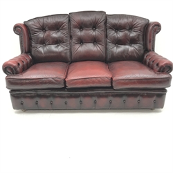 Georgian style three seat sofa upholstered in deep buttoned vintage red leather (W175cm) and pair of matching armchairs (W87cm)