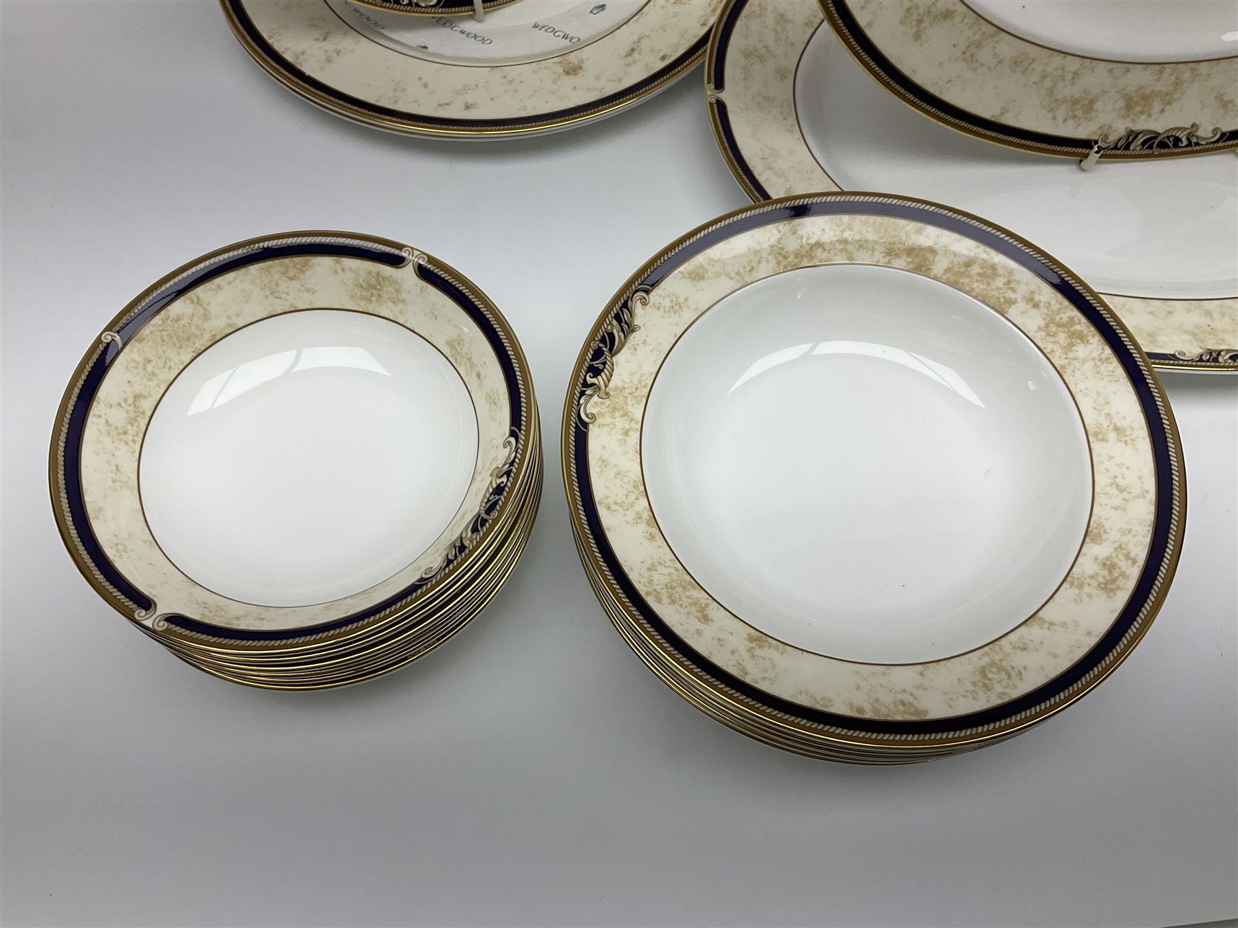 Wedgwood Cornucopia part dinner service, comprising six dinner plates, six soup bowls, six bowls, two serving platters, two oval dishes, covered serving dish, sauce boat and saucer (25)