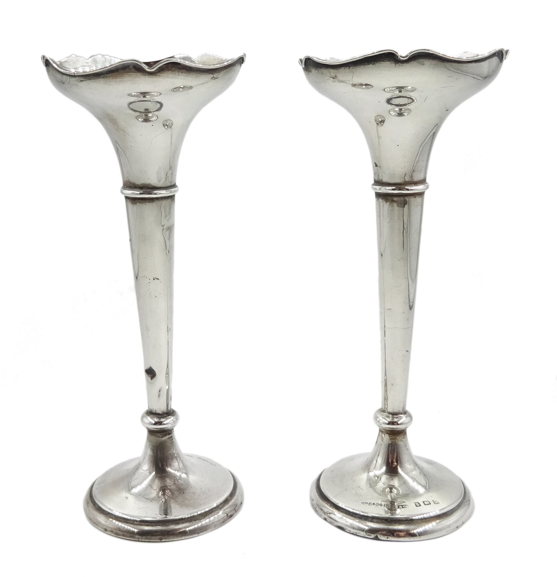 Edwardian silver three branch epergne by Cohen & Charles, Birmingham 1909 and two other silver specimen vases by Sydney & Co, Birmingham 1915