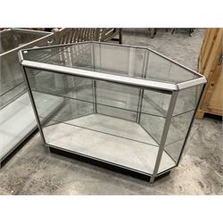 Corner aluminium and glass three tier display cabinet on castors - THIS LOT IS TO BE COLLECTED BY APPOINTMENT FROM DUGGLEBY STORAGE, GREAT HILL, EASTFIELD, SCARBOROUGH, YO11 3TX