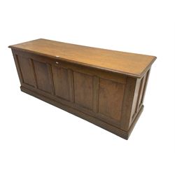 Illingworth Ingham and Co. School Furnishers (Leeds c1900) - early 20th century oak rostrum or headmaster's desk, rectangular top, the front and sides panelled with open reverse, on plinth base