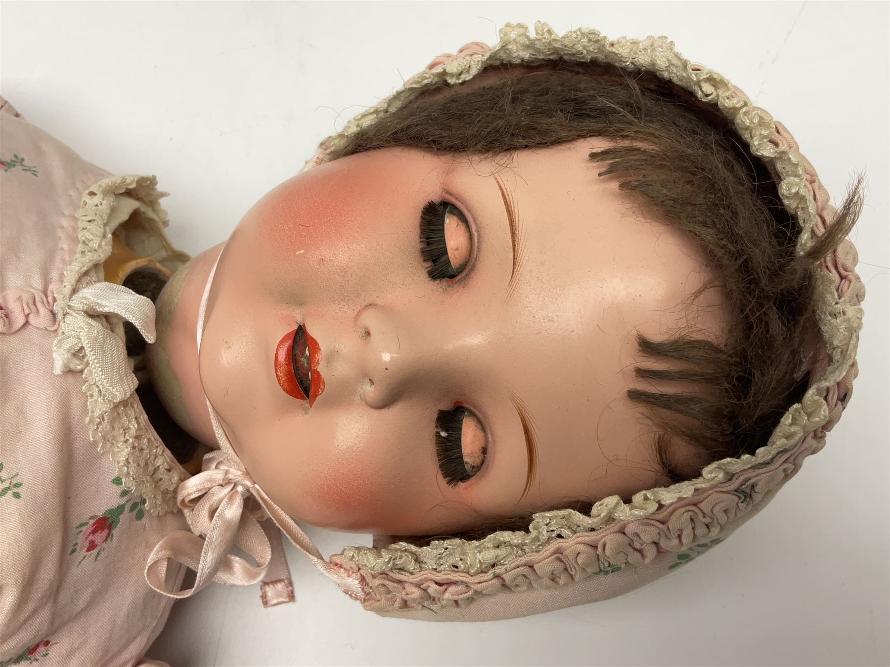 Armand Marseille Koppelsdorf composition head doll with applied hair, sleeping eyes, open mouth with teeth and tongue and composition body with jointed limbs, marked 'AM Koppelsdorf 970 Germany A.7.M' H55cm; Armand Marseille bisque head doll with applied hair, open mouth with teeth and composition body with jointed limbs, marked 'Armand Marseille 390n DRGM 246/1 A3/0M'; Fleur de Genet costume doll; and quantity of 1930s doll's house furniture