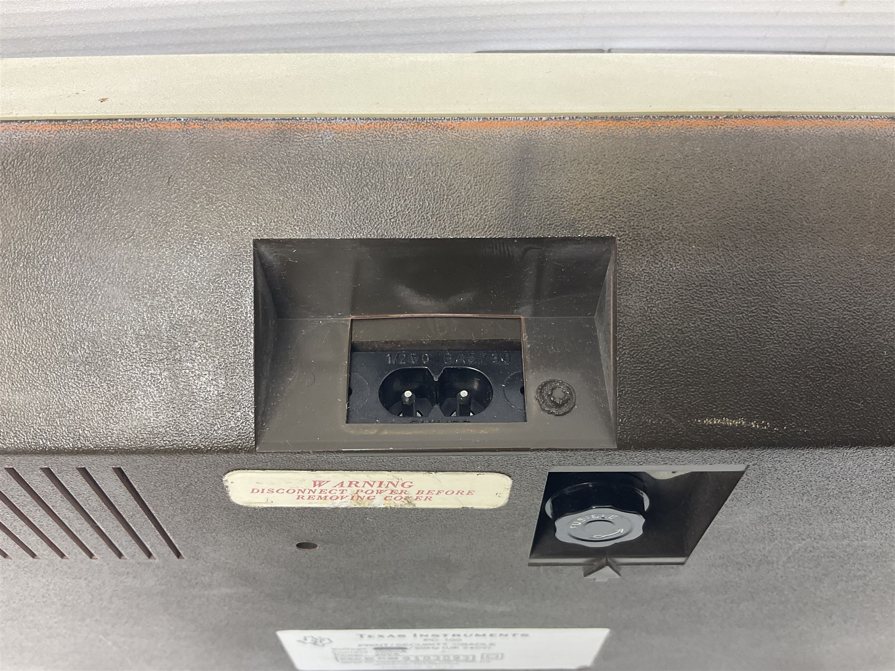 Four 1970s Sinclair electronic calculators - Cambridge in hard case with booklet; Scientific Programmable with Program Library and booklet; Scientific in hard case; and Oxford 300 in soft case with booklet; together with Texas PC-100 SR56 programmable slide-rule calculator on base station with readout, two booklets, keys and cover, serial no.9103093