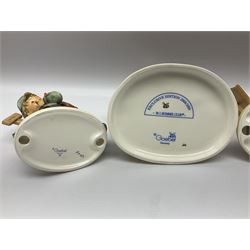 Twenty five Hummel figures by Goebel, to include Tuning up, Blessed Event, Book Worm, The Little Architect etc 