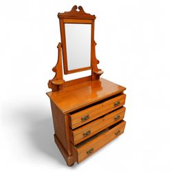 Early 20th century satin walnut wardrobe and dressing table, including a tall single wardrobe with mirrored door beneath a shaped cornice and moulded pediment, (H 205cm, D 39cm, W 91cm) and a matching dressing chest with glazed lift-top compartment and three drawers, mirror supported by scrolled uprights with flanking open shelves (H 170cm, D 45cm, W 84cm)