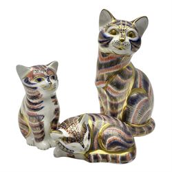 Three Royal Crown Derby paperweights, comprising of three cats, all with gold stoppers and printed mark beneath 