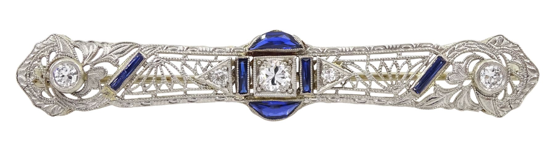 Art Deco platinum diamond and vari-cut synthetic sapphire bar open work brooch, in Charles Packer & Co Ltd, Regents Street, London box