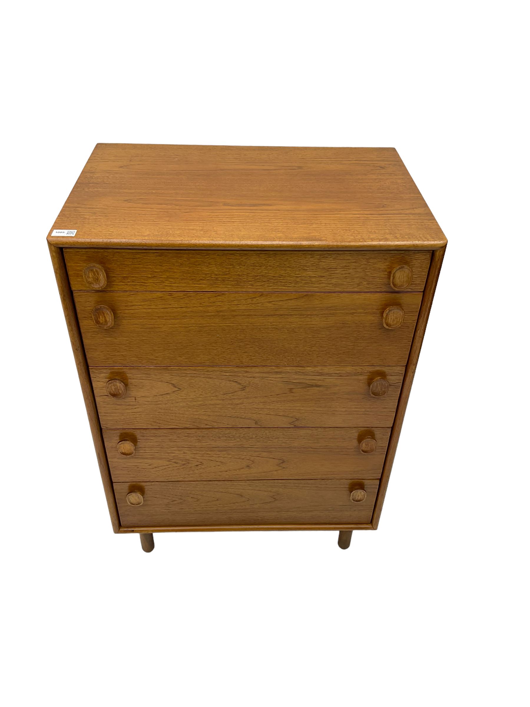 Meredew - mid-20th century teak chest of drawers, fitted with five drawers each with oval wood handles