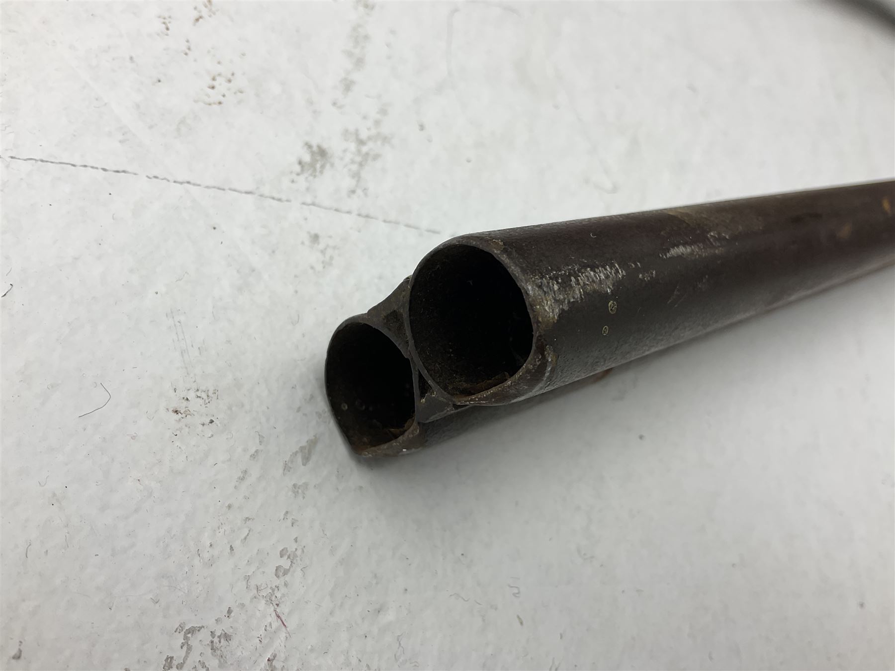 WW1 Lee Enfield SMLE .303 bolt action rifle with 63.5cm barrel and magazine; No.20934; L112cm overall; home deactivated by welding down bolt and end of barrel so requires re-deactivation to modern standards; and 19th century 12-bore double barrel hammer shotgun with 65cm cut-down barrels, non-rebounding hammers and under-lever opening, the lock-plate indistinctly inscribed G.T. Bartrant(?) L75cm overall; home deactivated by welding both barrels closed at breech so requires re-deactivation to modern standards (2) RFD ONLY 