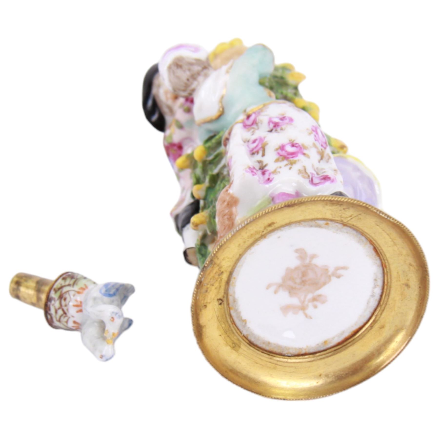 Sitzendorf perfume bottle, modelled as lovers around a tree, together with another continental perfume bottle of similar design, H11cm 
