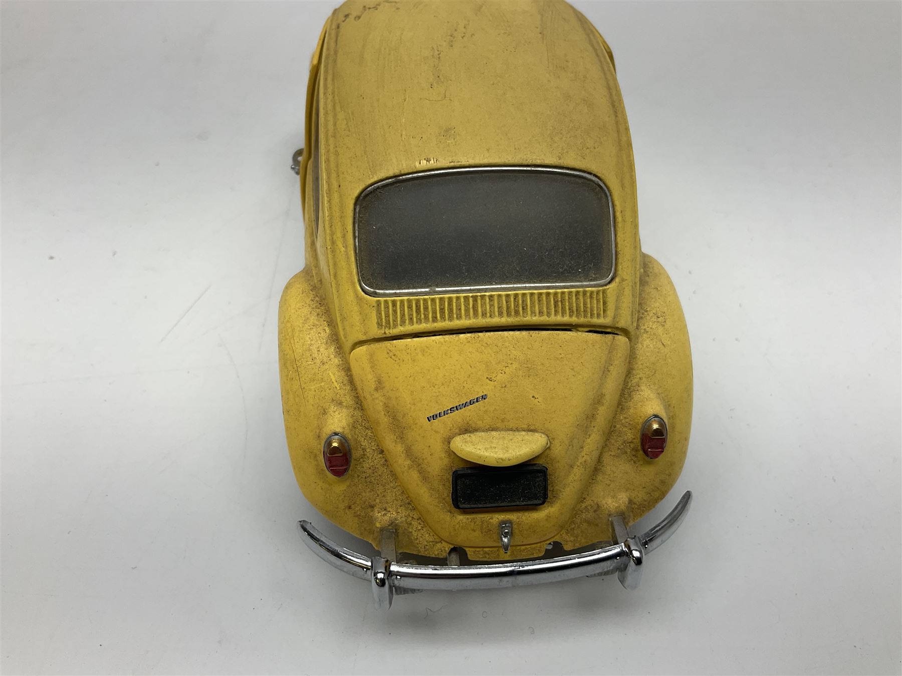 Franklin Mint - three die-cast models comprising 1:10 scale Harley Davidson Heritage Softail motorcycle, 1:24 scale 1957 VW Beetle and 1:24 scale 1993 Rolls Royce Corniche IV; all unboxed (3)